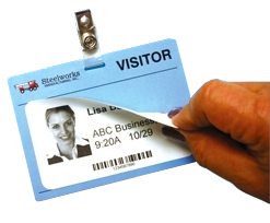 Adhesive visitor label with reusable name tag holder